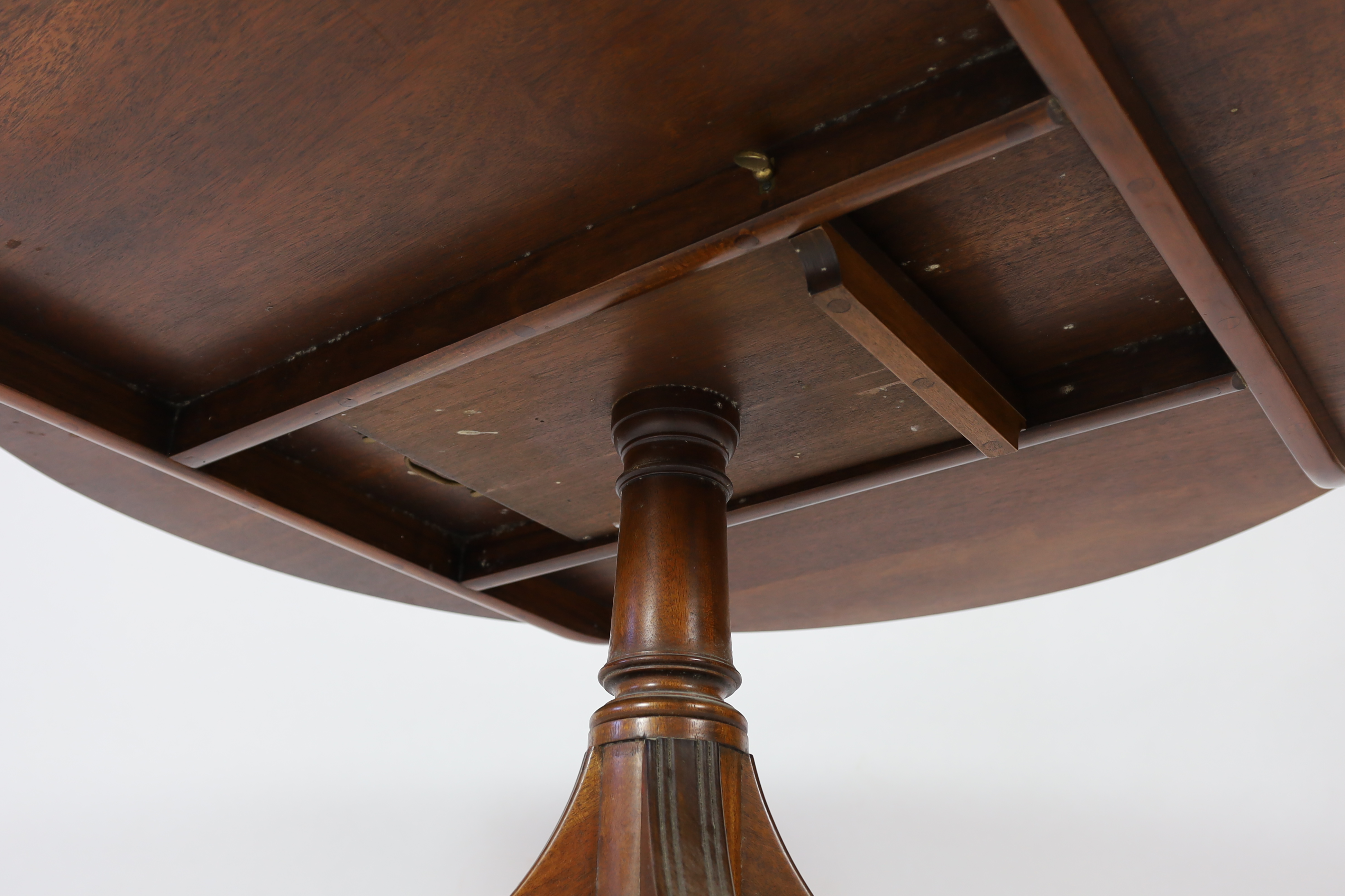 A Regency style mahogany gaming table, 146cm diameter, 75cm high